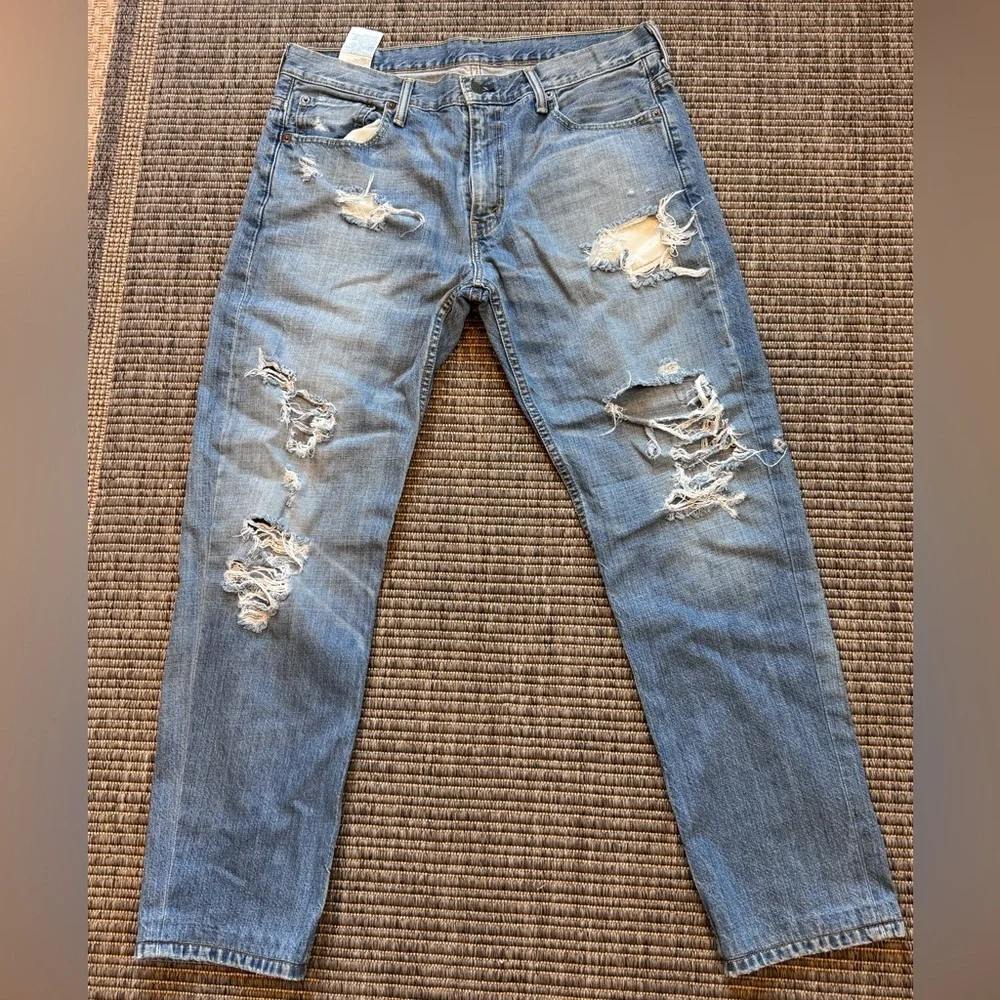 Levi's Men's 548 Light Blue Distressed Straight Leg Jeans Blank Tab